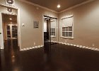 The bedroom looking toward the door and mirrored closet.jpg